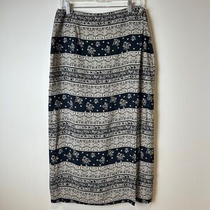 Vintage 90’s Women's Black and Cream Floral Patterned Wrap Midi Skirt